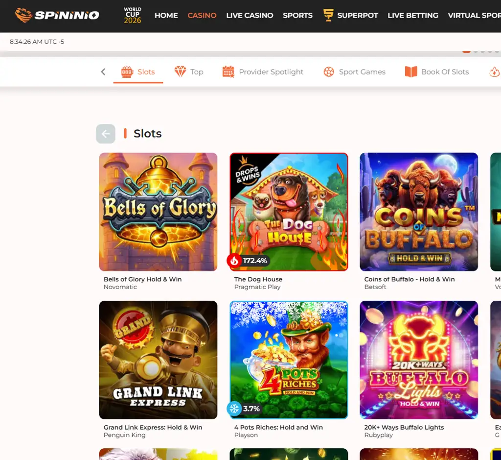 Spininio Casino desktop slots lobby screenshot presenting variety of slot games with categories and providers - verified